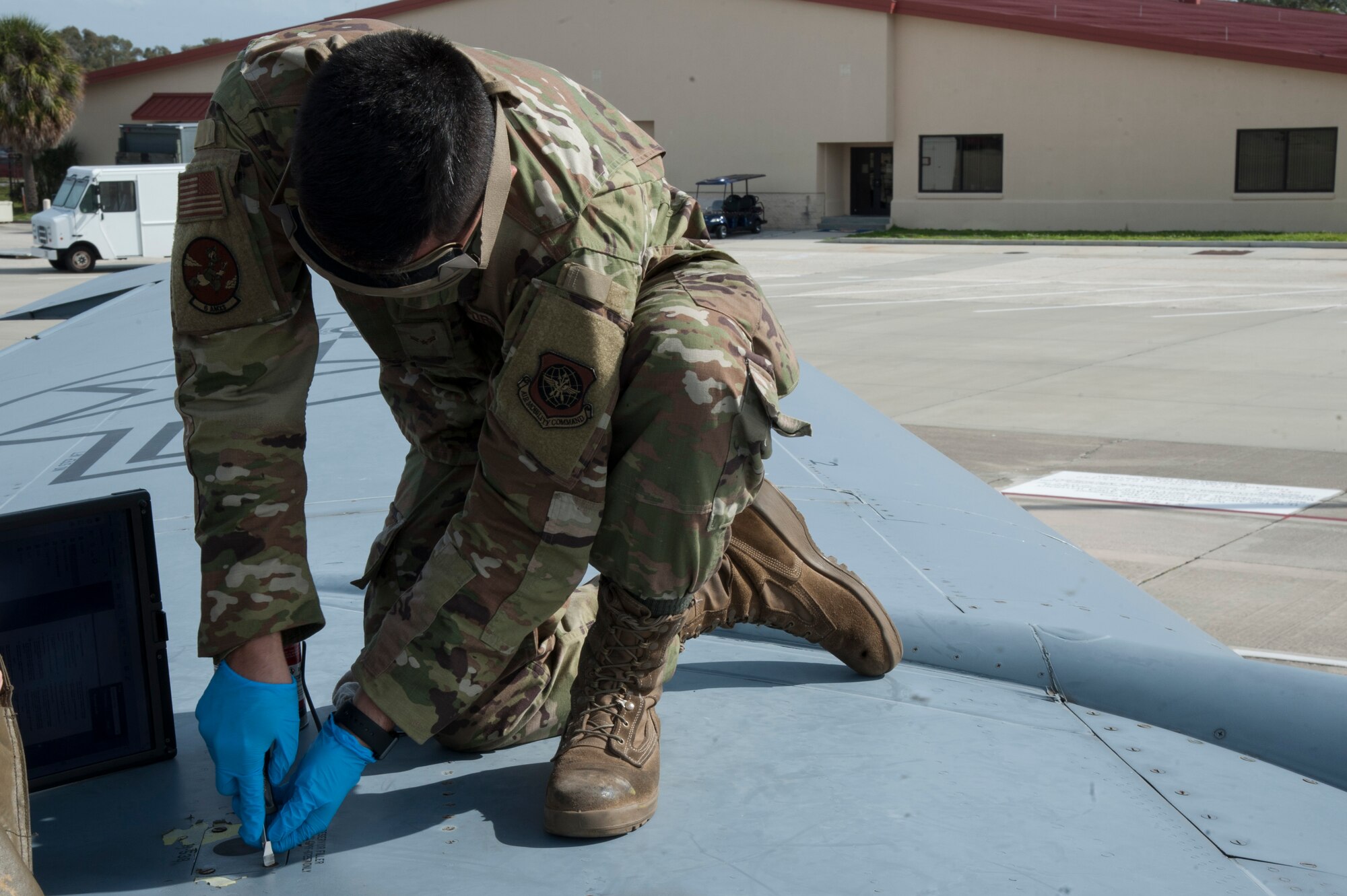 U.S. Air Force Airman 1st Class Trenton Carrere, a 6th Aircraft Maintenance Squadron crew chief, unfastens a screw on a KC-135 Stratotanker, Jan. 23, 2020, at MacDill Air Force Base, Fla. Air Force crew chiefs ensure all daily aircraft maintenance is performed, including refueling, defueling, launch, recovery, hydraulics, brakes and tires.