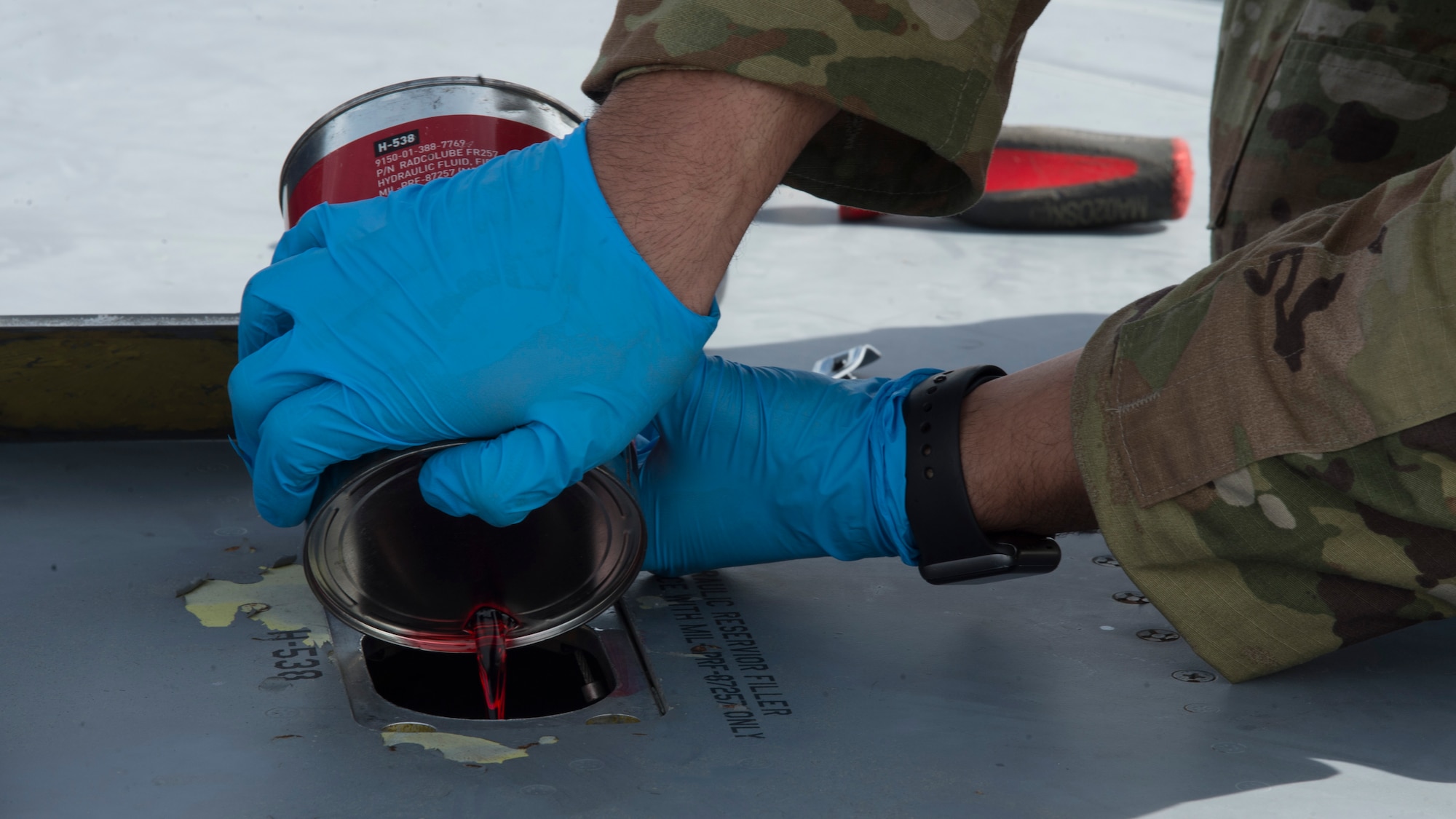 U.S. Air Force Airman 1st Class Trenton Carrere, a 6th Aircraft Maintenance Squadron (AMXS) crew chief, fills a hydraulic fluid reservoir on a KC-135 Stratotanker, Jan. 23, 2020, at MacDill Air Force Base, Fla. In 2019, the 6th AMXS supported over 5,000 flight hours and 965 sorties.