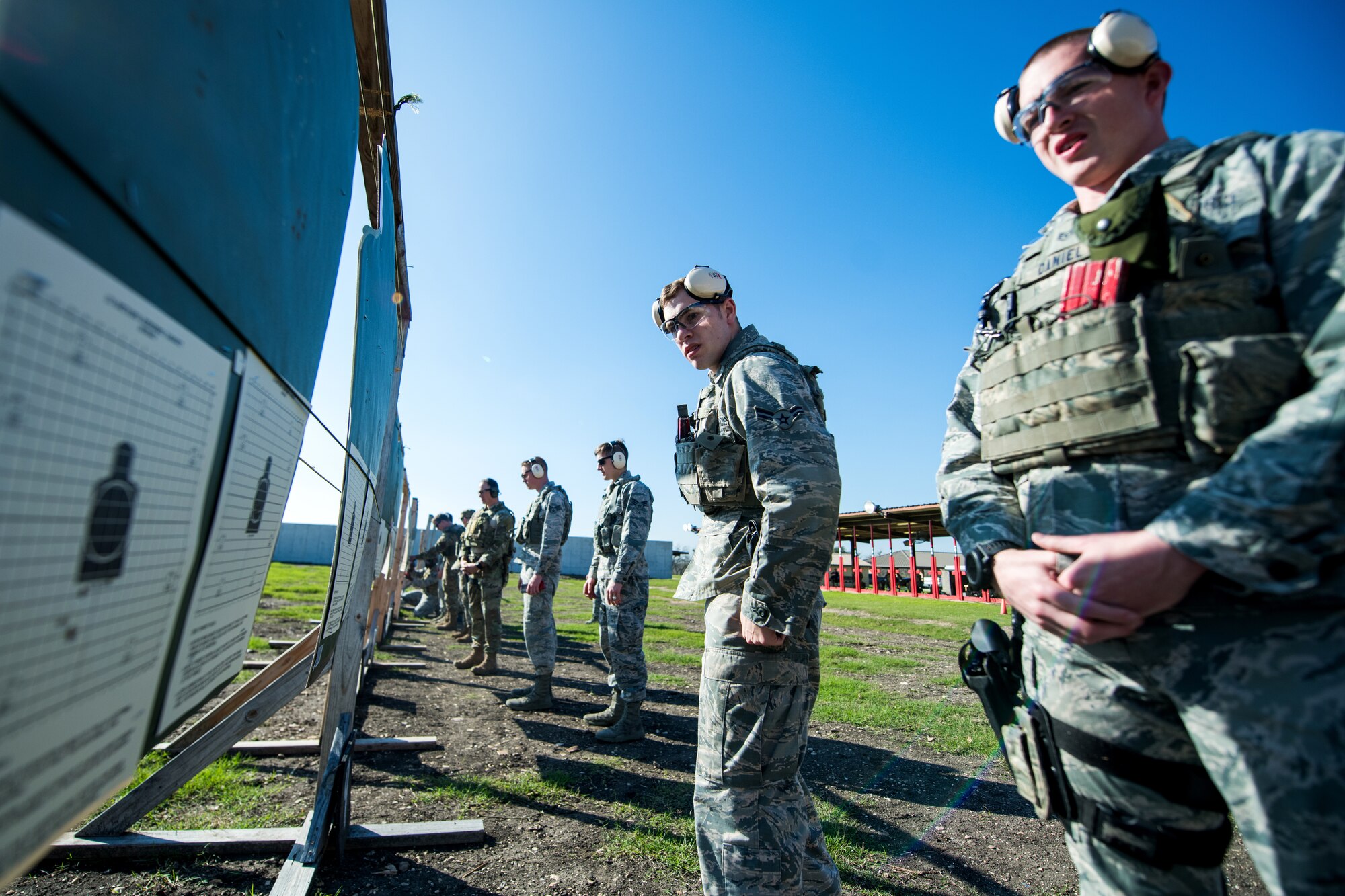 U.S. Air Force Security Forces Airmen take part in the firing range portion of the Air Education and Training Command Defender Challenge team tryout at Joint Base San Antonio-Medina Annex, Texas, Jan. 27, 2020. The five-day selection camp includes a physical fitness test, M-9 and M-4 weapons firing, the alpha warrior obstacle course, a ruck march and also includes a military working dog tryout as well. A total of 27 Airmen, including five MWD handlers and their canine partners, were invited to tryout for the team. The seven selectees to the AETC team will represent the First Command at the career field’s world-wide competition that will be held at JBSA-Camp Bullis in May 2020. (U.S. Air Force photo by Sarayuth Pinthong)