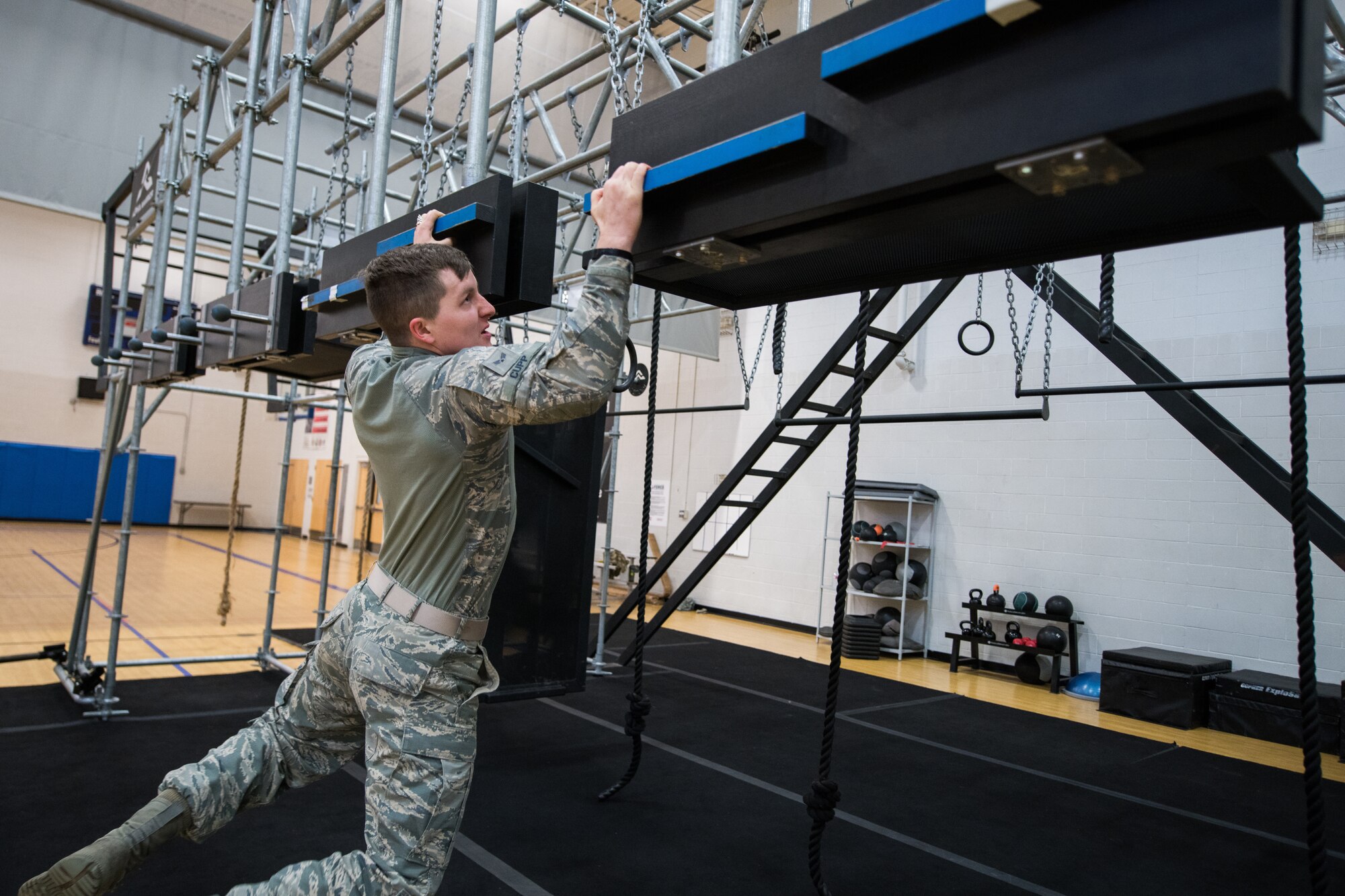 U.S. Air Force Senior Airman Paul Cupp, 42nd Security Forces Squadron, Maxwell Air Force Base, Ala., takes part in the alpha warrior portion of the Air Education and Training Command Defender Challenge team tryout at Joint Base San Antonio-Medina Annex, Texas, Jan. 28, 2020. The five-day selection camp includes a physical fitness test, M-9 and M-4 weapons firing, the alpha warrior obstacle course, a ruck march and also includes a military working dog tryout as well. A total of 27 Airmen, including five MWD handlers and their canine partners, were invited to tryout for the team. The seven selectees to the AETC team will represent the First Command at the career field’s world-wide competition that will be held at JBSA-Camp Bullis in May 2020. (U.S. Air Force photo by Sarayuth Pinthong)