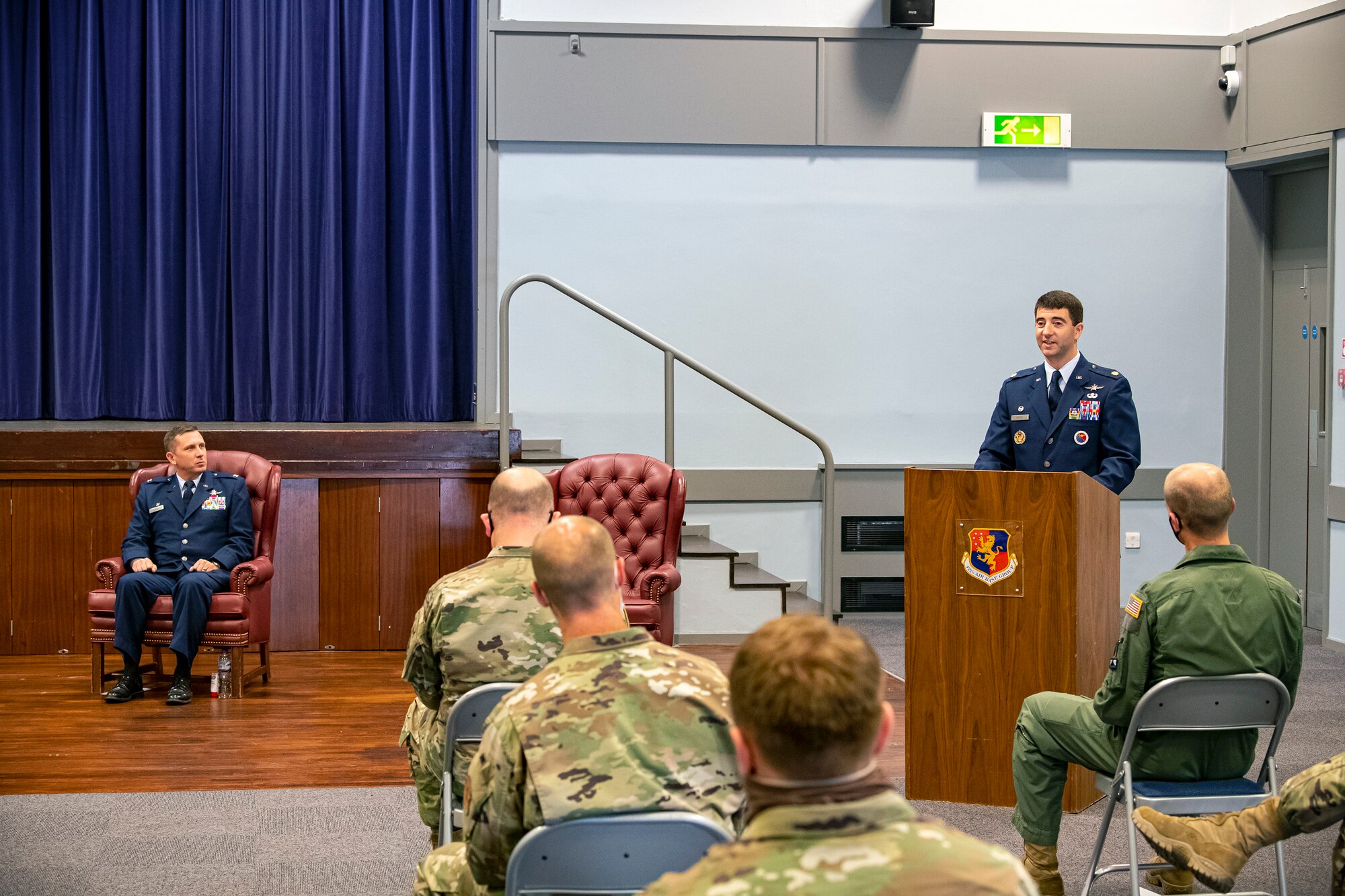 U.S. Air Force Maj. Adam Cross, right, 422d Communications Squadron incoming commander, speaks during an assumption of command ceremony at RAF Croughton, June 30, 2020. Cross has previously served on the Headquarters Air Force staff supporting the Office of Information Dominance and Chief Information Officer, Pentagon, Washington D.C. He has deployed in support of multiple contingency operations in Southwest Asia and the Horn of Africa. (U.S. Air Force photo by Senior Airman Eugene Oliver)