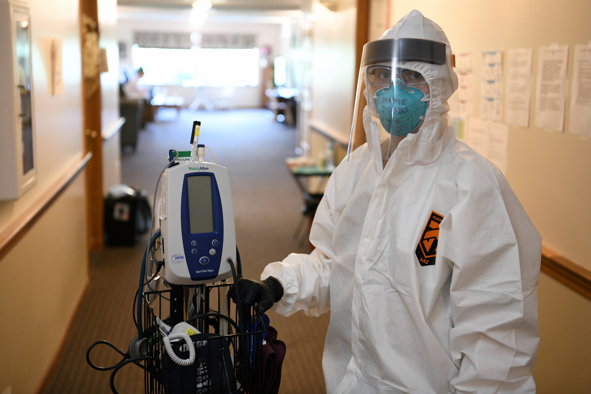 Staff Sgt. Kathryn Dobbs, an aerospace medical technician assigned to the 180th Fighter Wing, stands for a photo May 27, 2020, at the Carlin House in Logan, Ohio. Dobbs was part of a 20-person team of Ohio National Guard members who were tasked with helping at the assisted living facility after over half of their staff and residents tested positive for COVID-19. (U.S. Air National Guard photo by Staff Sgt. Amber Mullen)