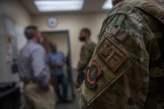 Members of the 628th Security Forces Squadron speak with Col. Marc Greene, 628th Air Base Wing commander, during an immersion brief June 19, 2020 at the Joint Base Charleston Weapons Station, S.C.