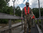 Col. Marc Greene, 628th Air Base Wing commander, prepares to board a harbor patrol boat during an immersion brief with the 628th Security Forces Squadron, June 19, 2020 on the Joint Base Charleston Weapons Station, S.C.