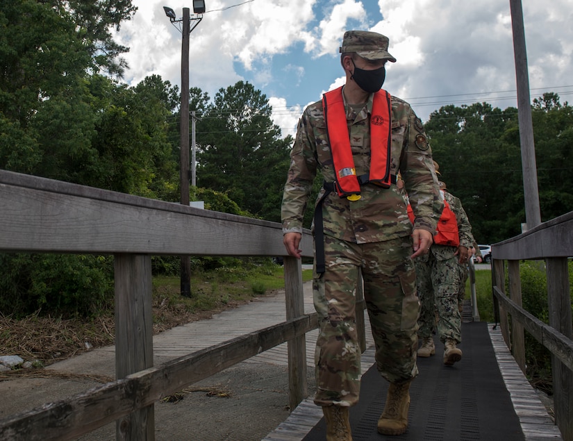 Col. Marc Greene, 628th Air Base Wing commander, prepares to board a harbor patrol boat during an immersion brief with the 628th Security Forces Squadron, June 19, 2020 on the Joint Base Charleston Weapons Station, S.C.