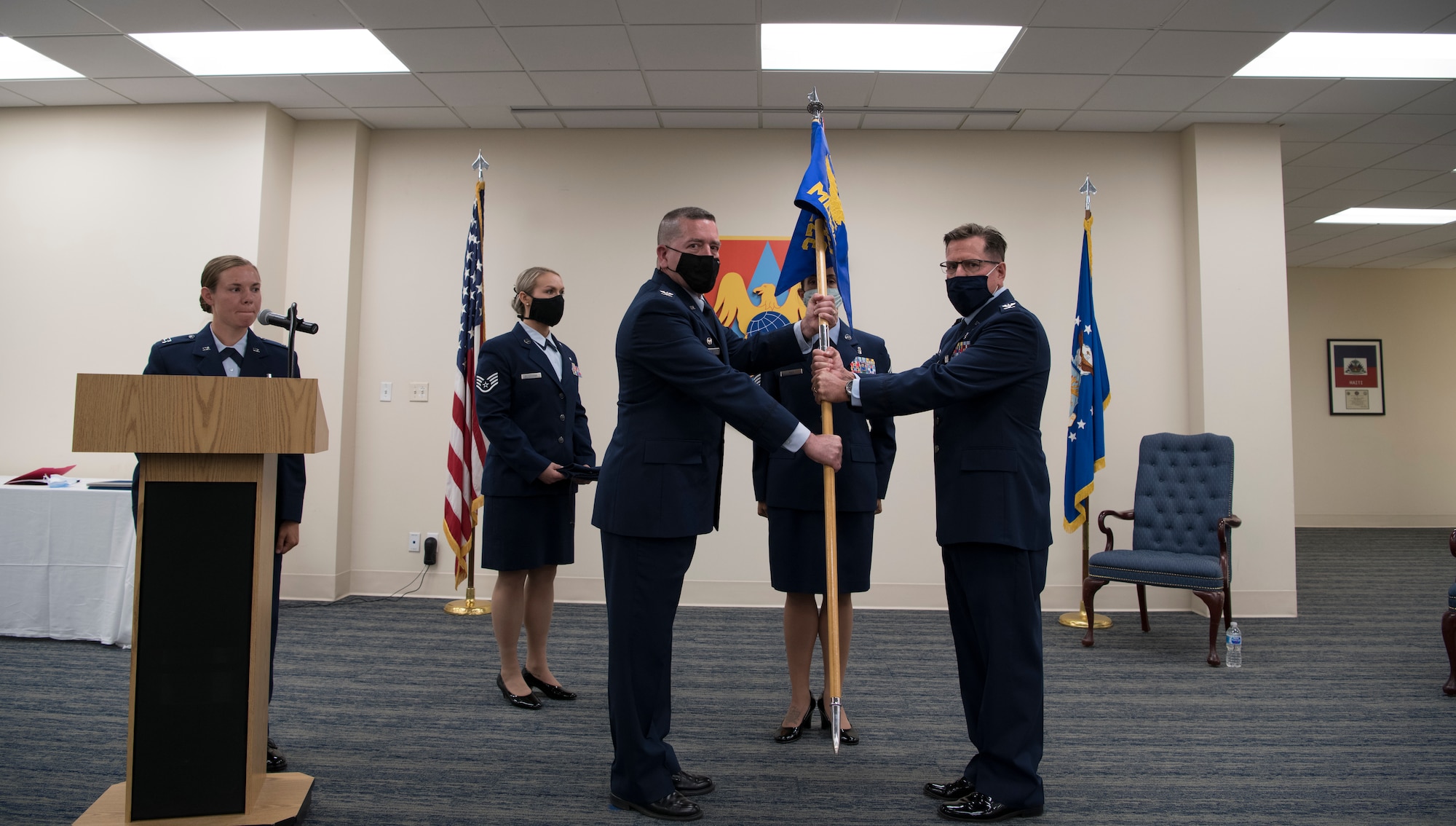 U.S. Air Force officers hold guidon