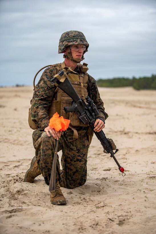 Lance Cpl. Joel Shewmaker, a combat engineer with Special Purpose Marine Air-Ground Task Force - Southern Command, patrols during a field exercise at Camp Lejeune, North Carolina, June 9, 2020. The FEX provides the Marines and Sailors the opportunity to stay proficient with their equipment and refine their tactical skill sets. SPMAGTF-SC is poised to conduct crisis response, general engineering training and theater security cooperations alongside partner nation militaries in Latin America and the Caribbean. Shewmaker is a native of Salem, Oregon. (U.S. Marine Corps photo by Sgt. Andy O. Martinez)