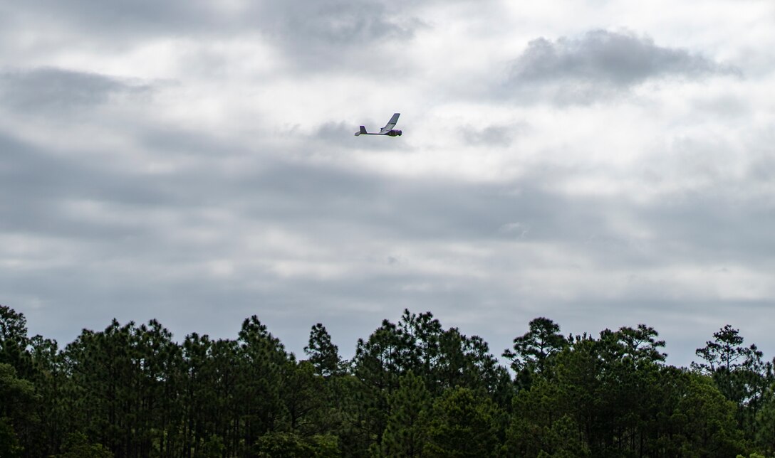 Marines with Special Purpose Marine Air-Ground Task Force - Southern Command operate an RQ-11B Raven during a field exercise at Camp Lejeune, North Carolina, June 11, 2020. The FEX provides the Marines and Sailors the opportunity to stay proficient with their equipment and refine their tactical skill sets. SPMAGTF-SC is poised to conduct crisis response, general engineering training and theater security cooperations alongside partner nation militaries in Latin America and the Caribbean. (U.S. Marine Corps photo by Sgt. Andy O. Martinez)