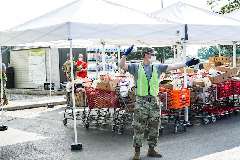 A soldier directing traffic at an Ohio food bank.