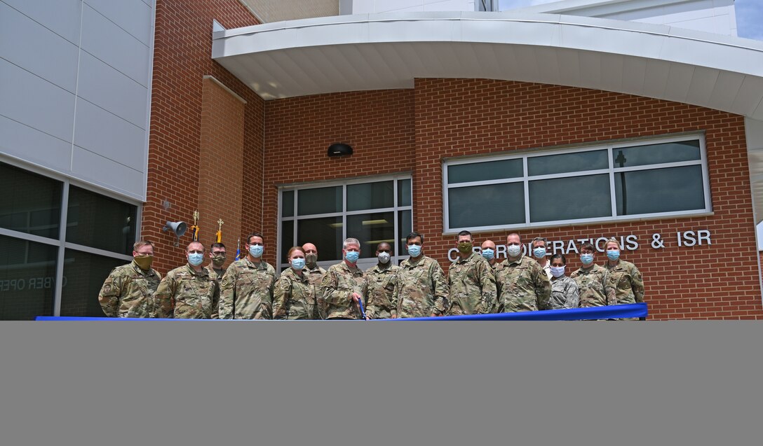 Leadership of the 175th Wing and 175th Cyberspace Operations Group attended a ribbon-cutting ceremony at Warfield Air National Guard Base, Middle River, Md., June 6, 2020. The ceremony marked the official opening of the new Cyberspace Operations Group and Intelligence, Surveillance, and Reconnaissance building at Warfield. (U.S. Air National Guard photo by Master Sgt. Christopher Schepers)