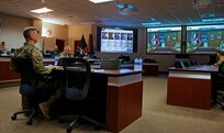 While maintaining safe social distancing, Maj. Gen. Todd Royar, U.S. Army Aviation and Missile Command commanding general, and his expert staff update their higher headquarters June 5 on continued improvements in aviation and missile readiness.