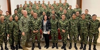 Ambassador Jean Manes, joined by U.S. Southern Command Commander Admiral Craig S. Faller, Colombian Army General Luis Navarro and Colombian Army Major General Eduardo Zapateiro, meets with a group of active duty women soldiers from the Colombian Army.