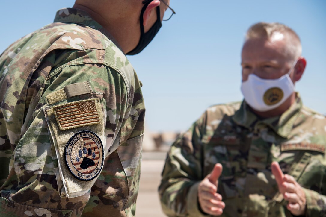 Gen. Arnold W. Bunch Jr., left, Air Force Materiel Command commander, speaks with Col. Frank Marconi, 635th Materiel Maintenance Group commander, during Bunch’s Basic Expeditionary Airfield Resources Base tour, June 29, 2020, at the 635th MMG on Holloman Air Force Base, N.M. The patch worn on Bunch’s arm is a “BEAR” patch sporting an American flag in the background. BEAR base is accountable for the storage, inspection, repair, deployment and assets belonging to AFMC. (U.S. Air Force photo by Senior Airman Collette Brooks)