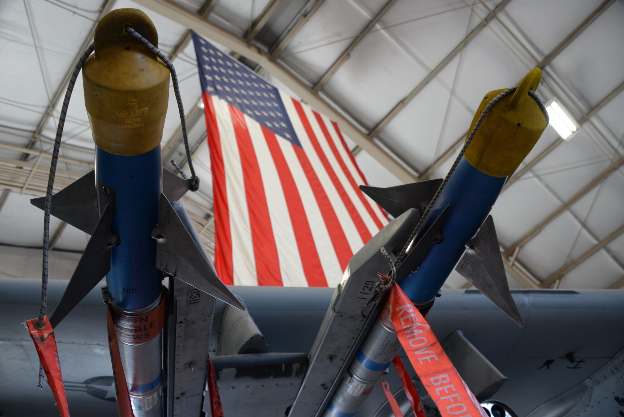 A photo of munitions sitting on an A-10.