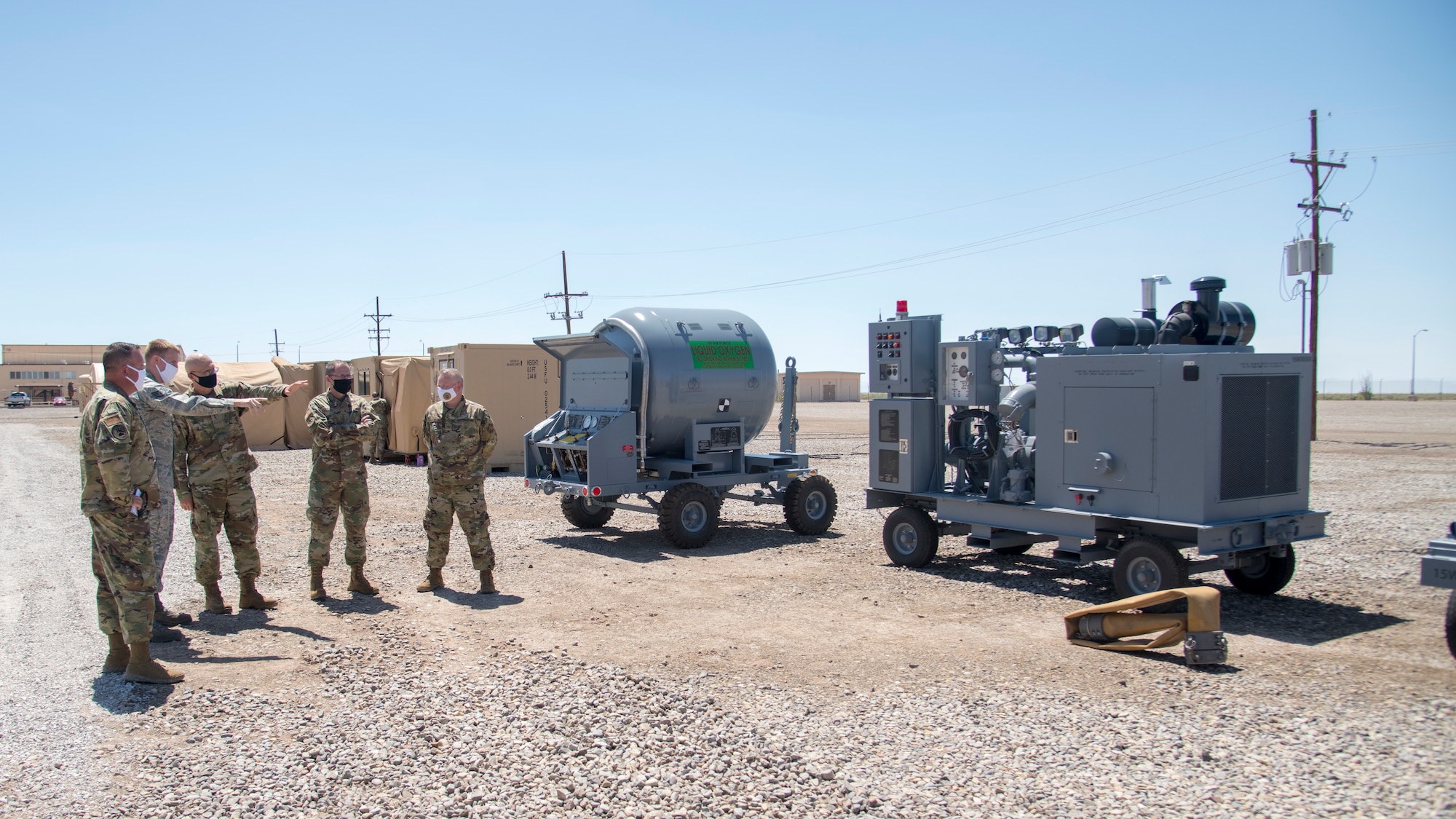 Gen. Arnold W. Bunch Jr., Air Force Materiel Command commander, receives a tour of the Basic Expeditionary Airfield Resources Base, June 29, 2020, at the 635th Materiel Maintenance Group on Holloman Air Force Base, N.M. Bunch’s tour included meeting with various Airmen across the installation in order to see how units remained resilient and successful despite challenges derived from the global COVID-19 pandemic. (U.S. Air Force photo by Senior Airman Collette Brooks)