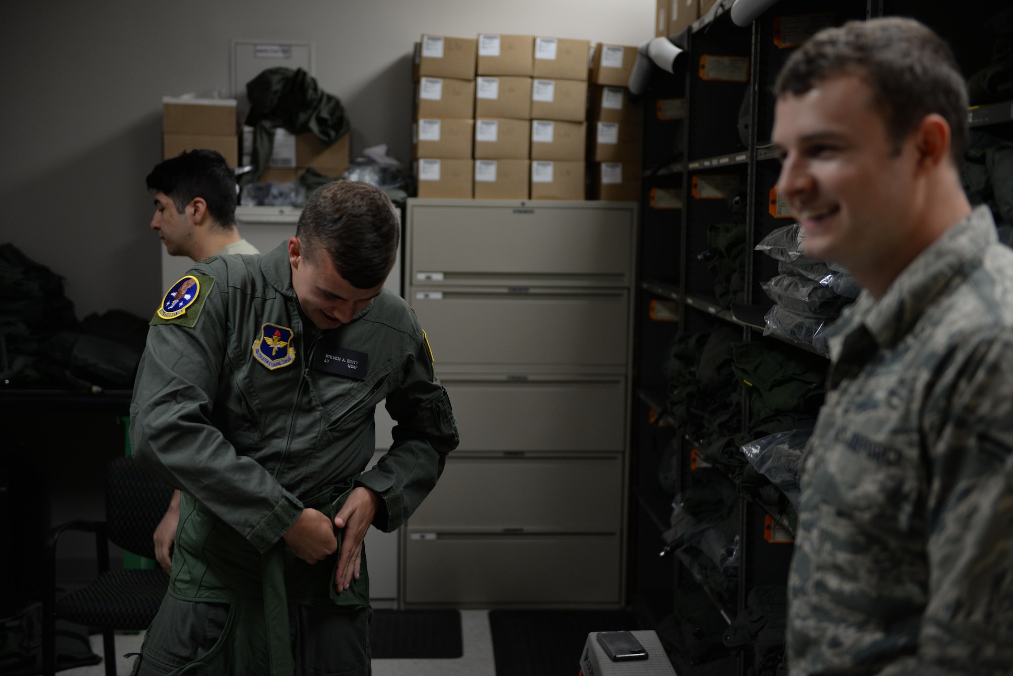 Second Lt. Steven Britt, 37th Flying Training Squadron student pilot, puts on a G-suit at Columbus Air Force Base Miss. Even with 2,600 flying hours and 741 combat hours, the challenge of bringing in students and creating world-class aviators can’t be understood without PIT. (U.S. Air Force photo by Airman 1st Class Davis Donaldson)