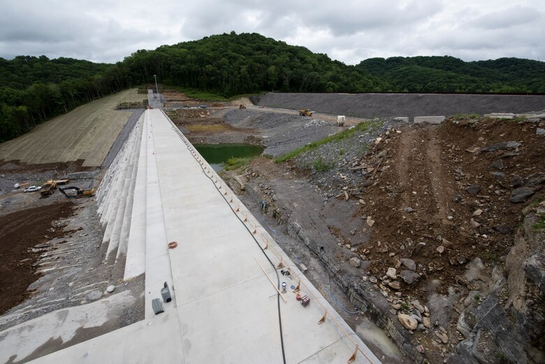 Officials held a ceremony July 1, 2020 to celebrate the completion of the last phase of repairs for the $353 million Center Hill Dam Safety Rehabilitation Project.  The U.S. Army Corps of Engineers Nashville District recently finished constructing a roller compacted concrete berm to reinforce the auxiliary dam at Center Hill Lake, a secondary earthen embankment that fills a low area in the landscape just east of the main dam. Construction of the $50 million RCC Berm completes the final major construction contract to remediate the Center Hill project. (USACE Photo by Lee Roberts)