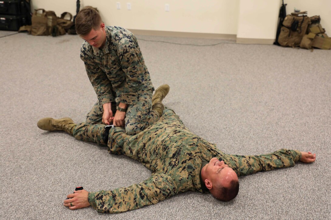 Enlisted Marines from U.S. Marine Corps Forces Korea participated in an enlisted-specific training day event on 26 June 2020. During the training, the Marines utilized the Engagement Skills Trainers aboard USAG Humphreys and got a hands-on Tactical Combat Casualty Care class in which they reviewed how to properly apply a tourniquet under stressful circumstances. The Marines also utilized simulated M240 Bravo machineguns while being taught weapon's functions and how to operate the crew served weapon. This training helps Marines maintain readiness and answer the call to Fight Tonight! (U.S. Marine Corps Photo by Sgt. Parker R. Golz)
