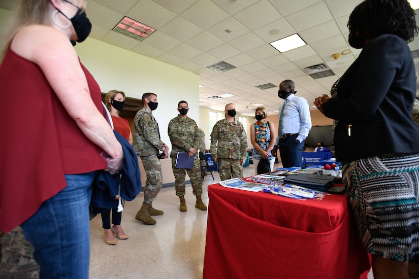 Representatives from the 316th Wing Staff Agency brief leadership from the 316th Wing and 89th Air Lift Wing about Comprehensive Airman Fitness during an immersion tour at Chapel One on Joint Base Andrews, Md., on June 29, 2020.