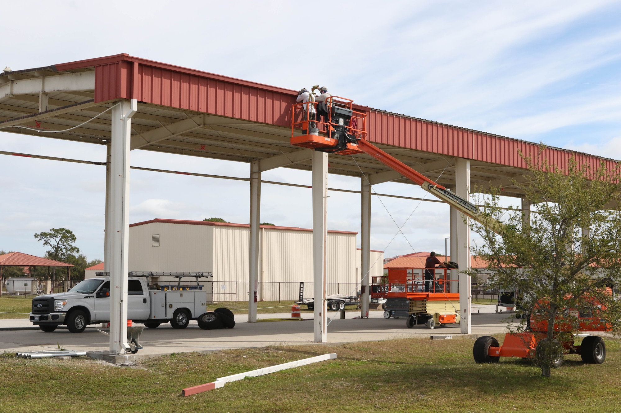 Construction workers began tear down procedures of the existing base supply and equipment shed, March 6, 2020,
