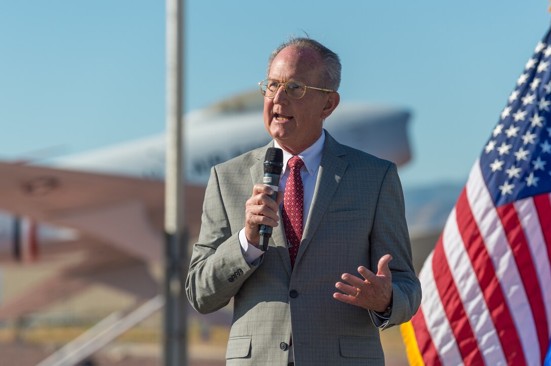 Dr. David Smith, Operating Location Air Force Plant 42 Director, provides his remarks following a Change of Leadership Ceremony at Plant 42 in Palmdale, California. (Air Force photo by Ethan Wagner)