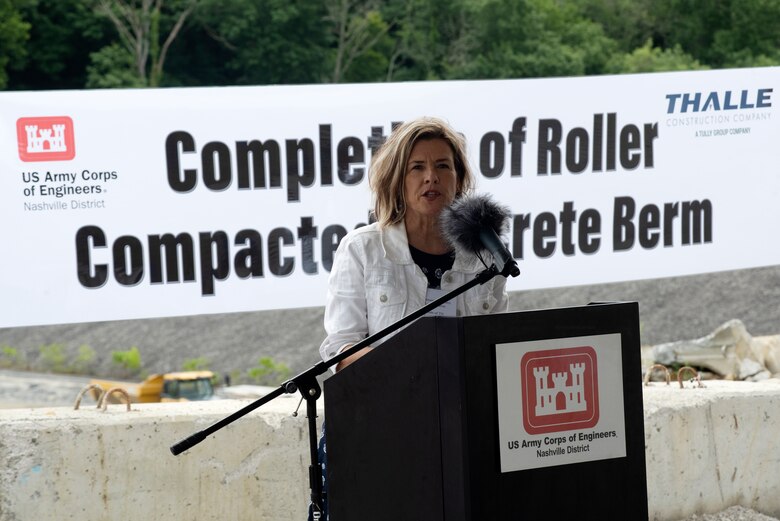 Tennessee District 40 Rep. Terri Lynn Weaver addresses guests at the Center Hill Lake Auxiliary Dam July 1, 2020 during a ceremony celebrating the completion of the last phase of repairs for the $353 million Center Hill Dam Safety Rehabilitation Project. The U.S. Army Corps of Engineers Nashville District recently finished constructing a roller compacted concrete berm to reinforce the auxiliary dam at Center Hill Lake, a secondary earthen embankment that fills a low area in the landscape just east of the main dam. (USACE Photo by Lee Roberts)
