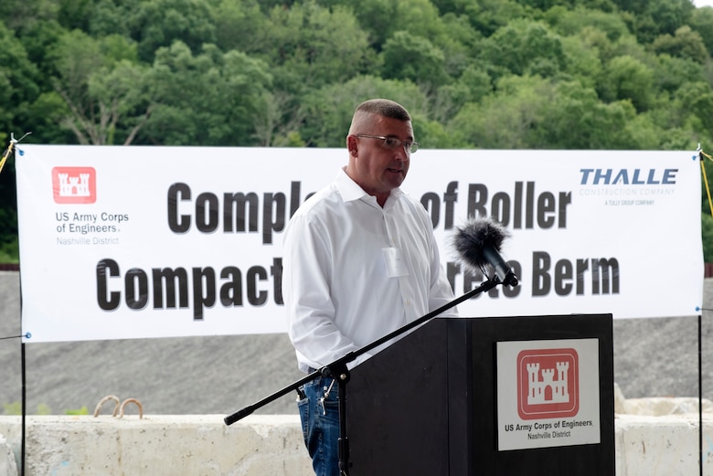 Steve Kohler, president and chief executive officer of Thalle Construction Corporation, speaks about the technical processes of constructing a roller compacted concrete berm and challenges the contractor faced and overcame during a ceremony July 1, 2020 in Silver Point, Tennessee, celebrating the completion of the $50 million RCC berm that stabilizes the left rim of Center Hill Lake and reduces risk of both an internal erosion foundation failure and a potential overtopping failure mode at the saddle dam. (USACE Photo by Lee Roberts)