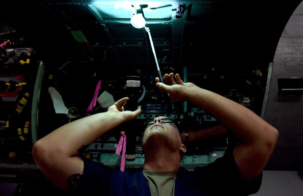 .S. Air Force aircraft maintenance Airmen from the 378th Expeditionary Maintenance Squadron execute aircraft maintenance inspection on an F-15C Eagle aircraft at Prince Sultan Air Base, Kingdom of Saudi Arabia, June 30, 2020.