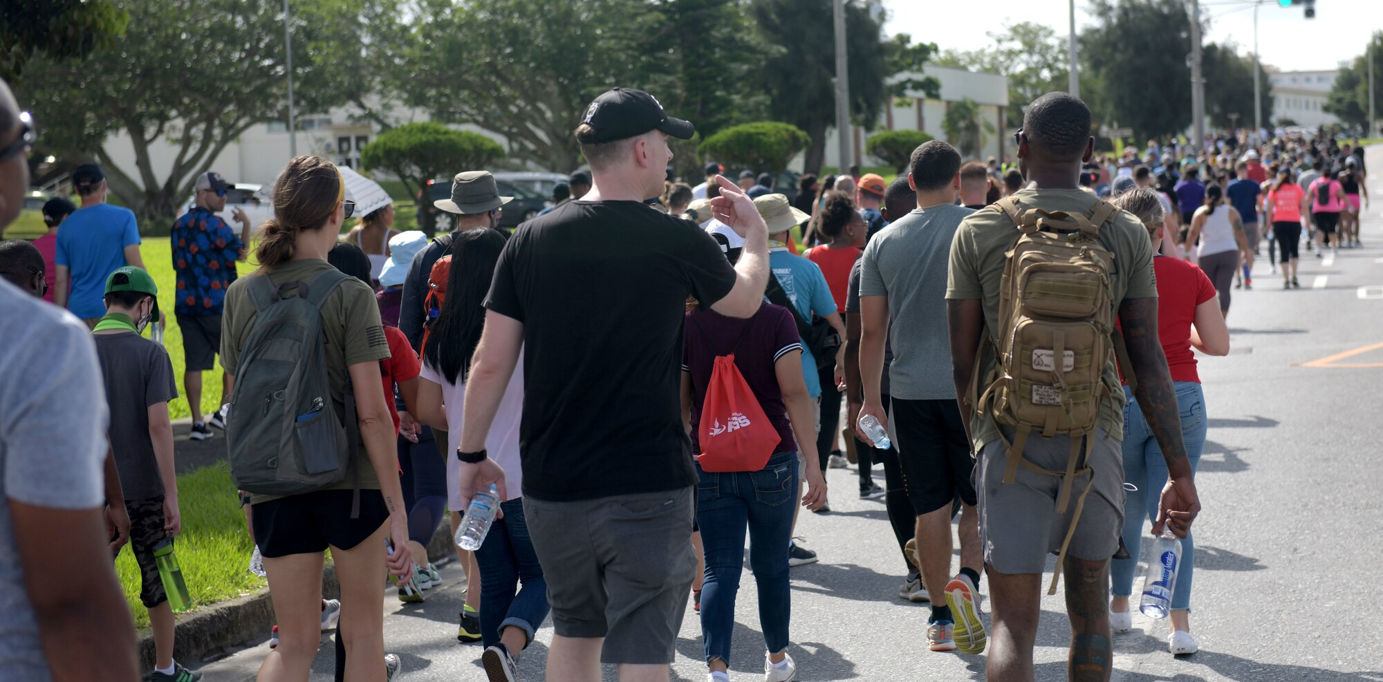 Service members, civilians, contractors and families participate in the Walk for Unity 5K at Kadena Air Base, Okinawa, Japan, June 20, 2020. The event signified Team Kadena’s commitment to bringing the community together and resolving racial divides and inequalities in our nation and Air Force. (U.S. Air Force photo by Staff Sgt. Daryn Murphy)
