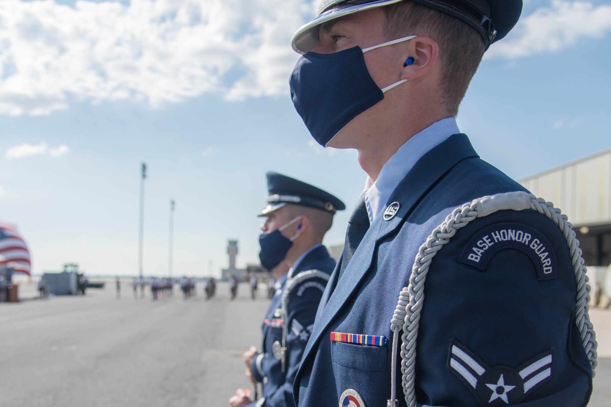 Members of the Dover Air Force Base Honor Guard stand at parade rest prior to the annual Port Dawg Memorial 5k June 29, 2020, at Dover Air Force Base, Delaware. This is the first year the Dover Air Force Base Honor Guard has been a part of the ceremony to honor fallen Port Dawgs. (U.S. Air Force photo by Airman 1st Class Faith Schaefer)