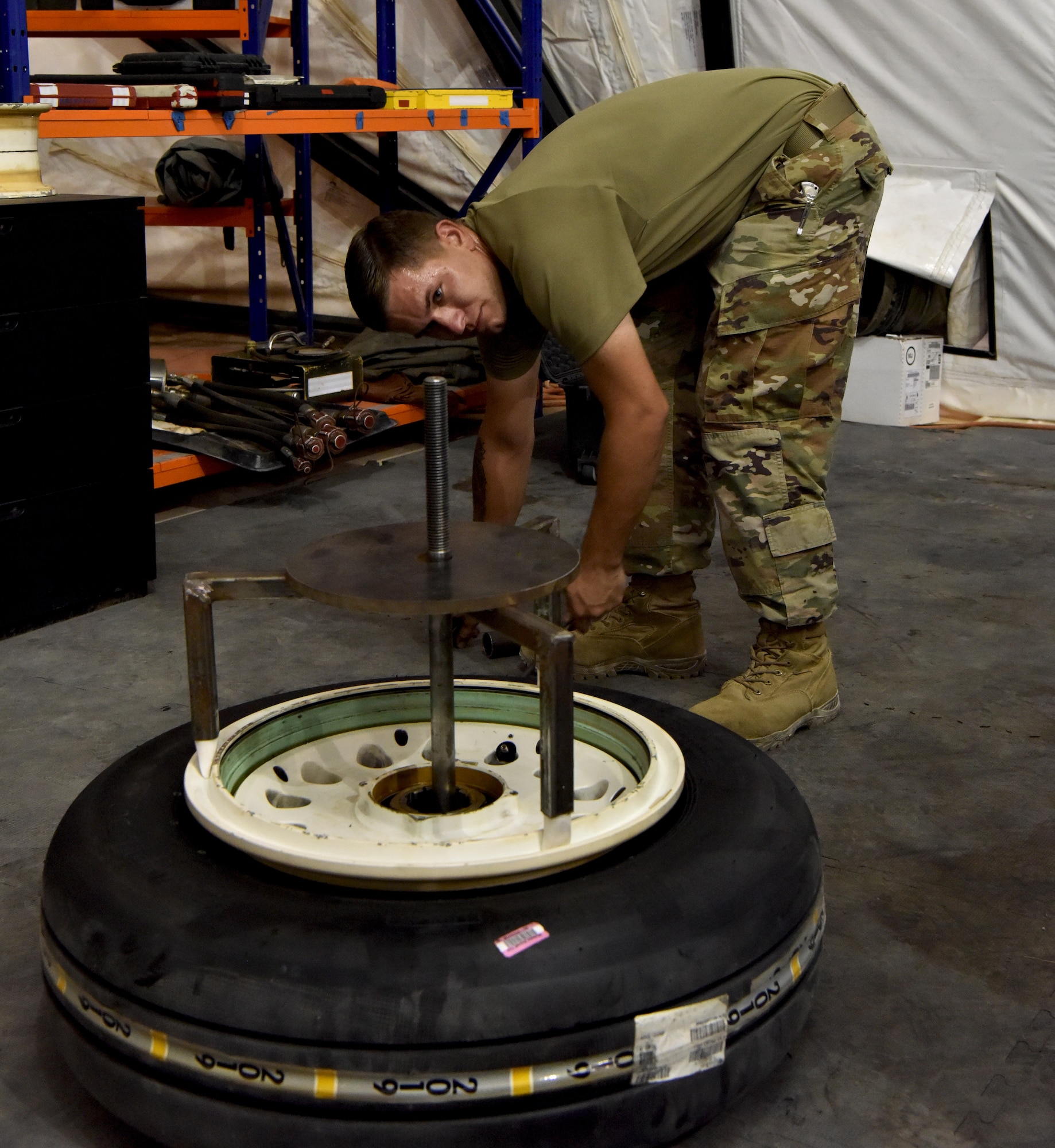 .S. Air Force aircraft maintenance Airmen from the 378th Expeditionary Maintenance Squadron execute aircraft maintenance inspection on an F-15C Eagle aircraft at Prince Sultan Air Base, Kingdom of Saudi Arabia, June 30, 2020.