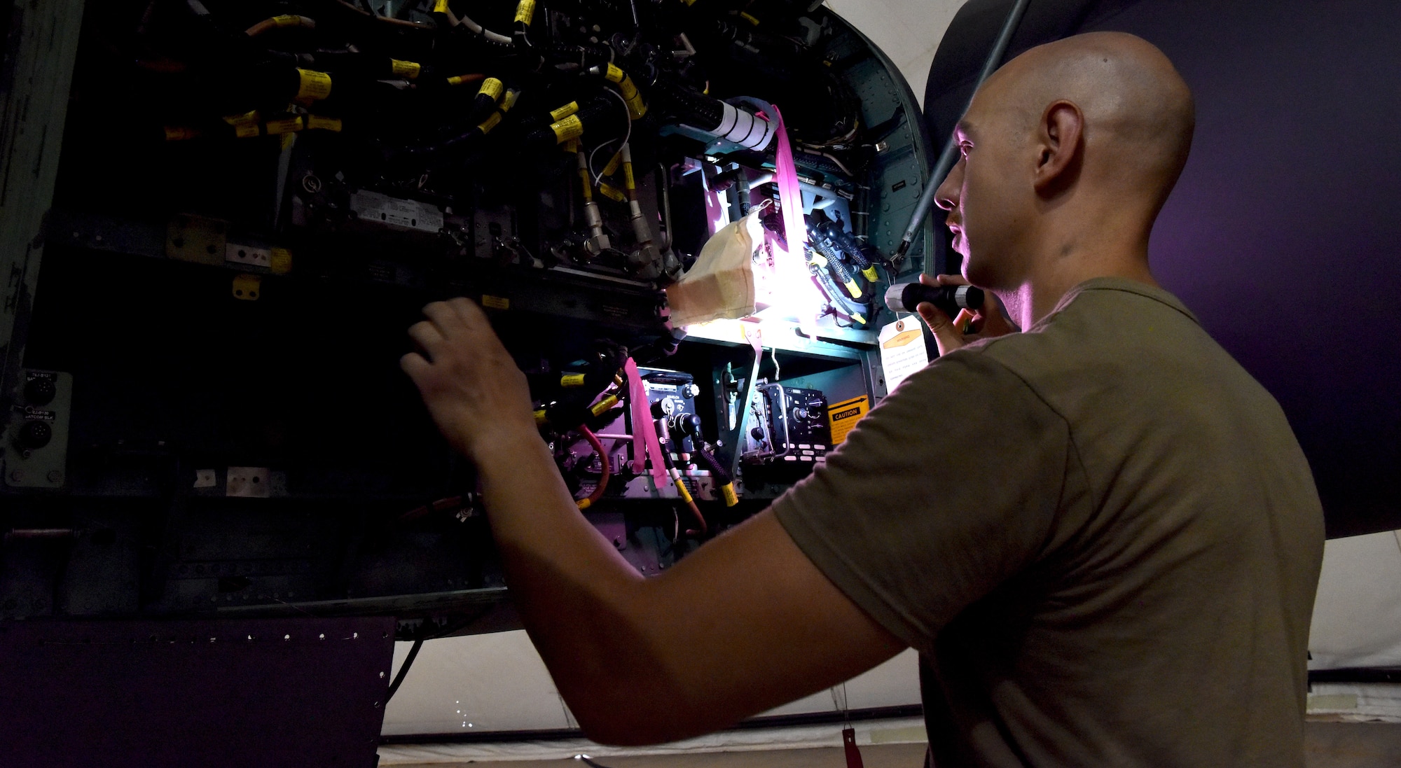 .S. Air Force aircraft maintenance Airmen from the 378th Expeditionary Maintenance Squadron execute aircraft maintenance inspection on an F-15C Eagle aircraft at Prince Sultan Air Base, Kingdom of Saudi Arabia, June 30, 2020.