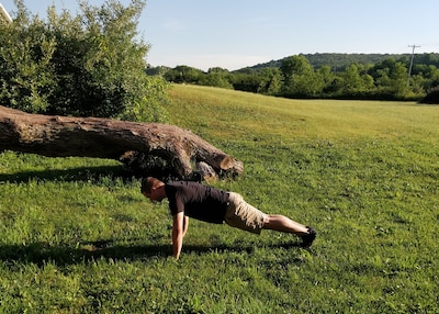 Dan Roberts demonstrates a plank exercise, which can easily transition into a pushup, burpee or vertical jump.