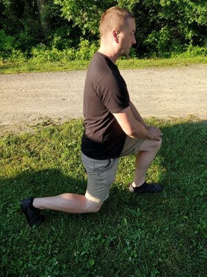 Dan Roberts demonstrates a lunge used as part or the 8-week challenge.