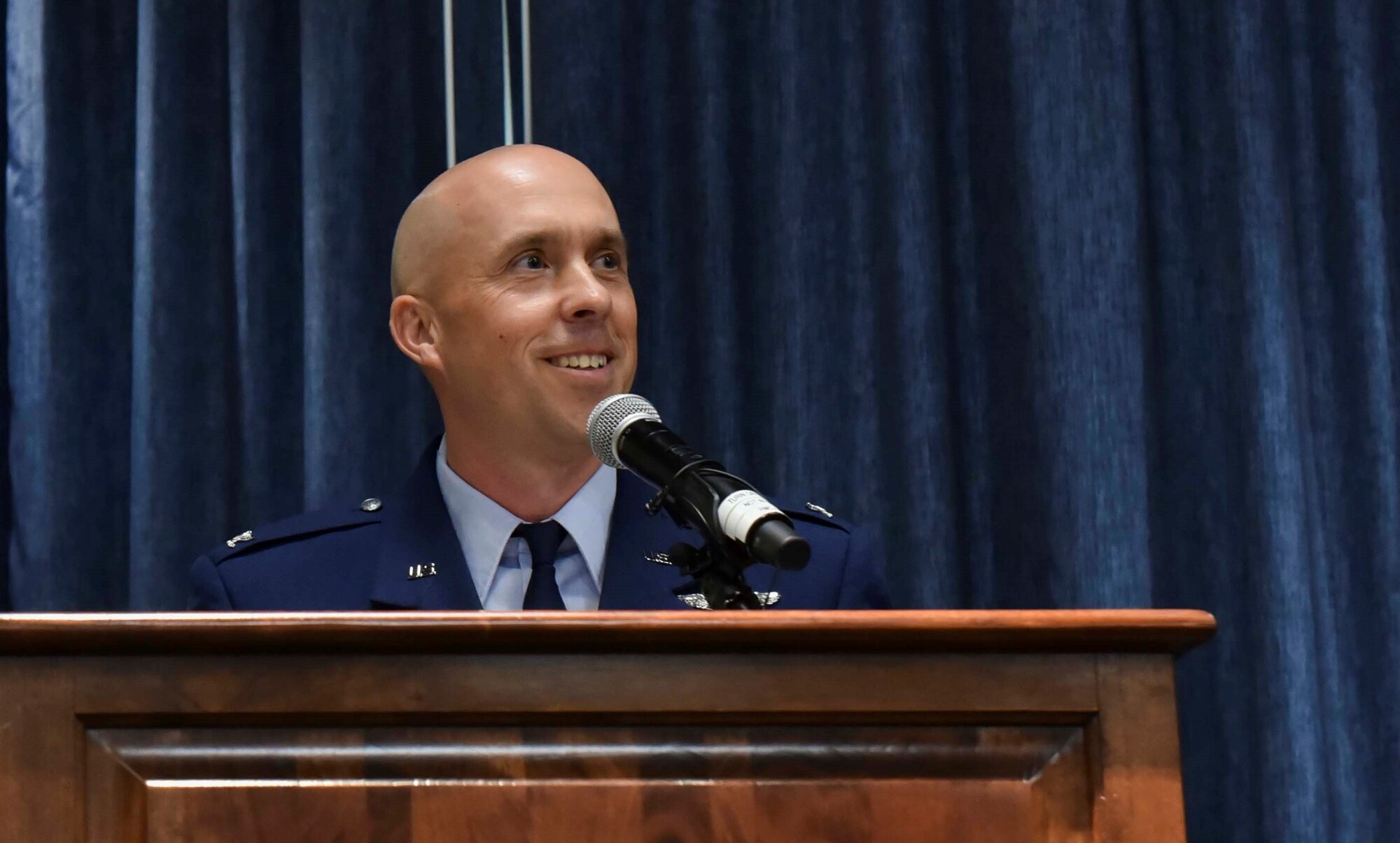 U.S. Air Force Col. Cassius Bentley, 92nd Air Refueling Wing commander, gives a speech during the 92nd ARW change of command ceremony