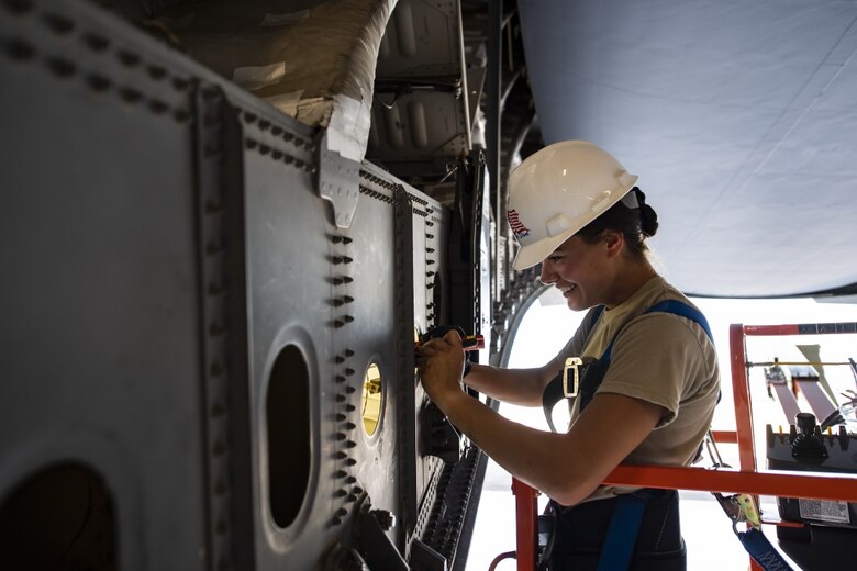 Maintenance Airmen inspect C-17