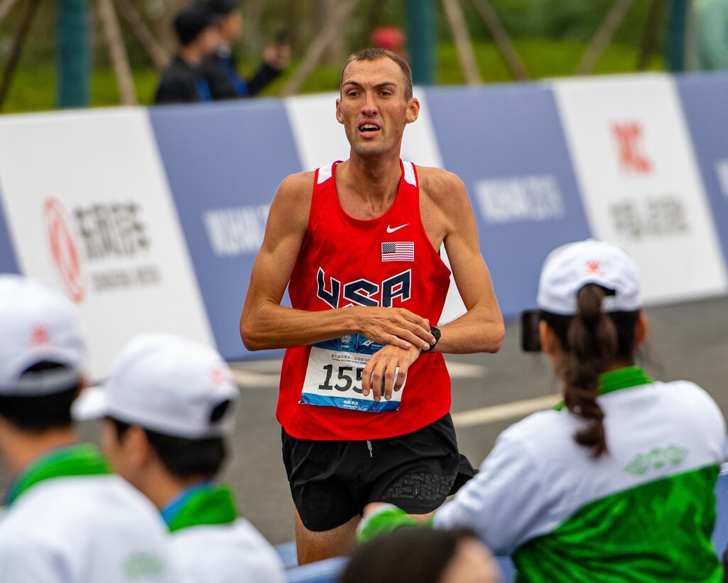 U.S. Navy Lt. Patrick Hearn, U.S Armed Forces Marathon Team member, crosses the finish line during the 7th Conseil International du Sport Militaire World Games in Wuhan, China Oct. 27, 2019. (U.S. Army photo by Staff Sgt. Vito T. Bryant)