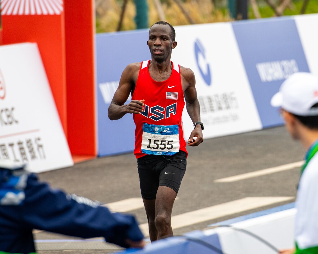 U.S. Army 2nd Lt. Samson Mutua, U.S Armed Forces Marathon Team member, crosses the finish line during the 7th Conseil International du Sport Militaire World Games in Wuhan, China Oct. 27, 2019. (U.S. Army photo by Staff Sgt. Vito T. Bryant)
