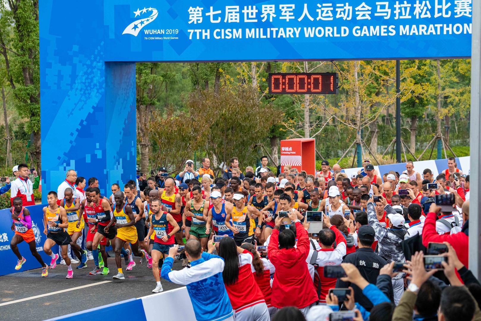 Marathon competitors cross the start line during the 7th Conseil International du Sport Militaire World Games in Wuhan, China Oct. 27, 2019. (U.S. Army photo by Staff Sgt. Vito T. Bryant)