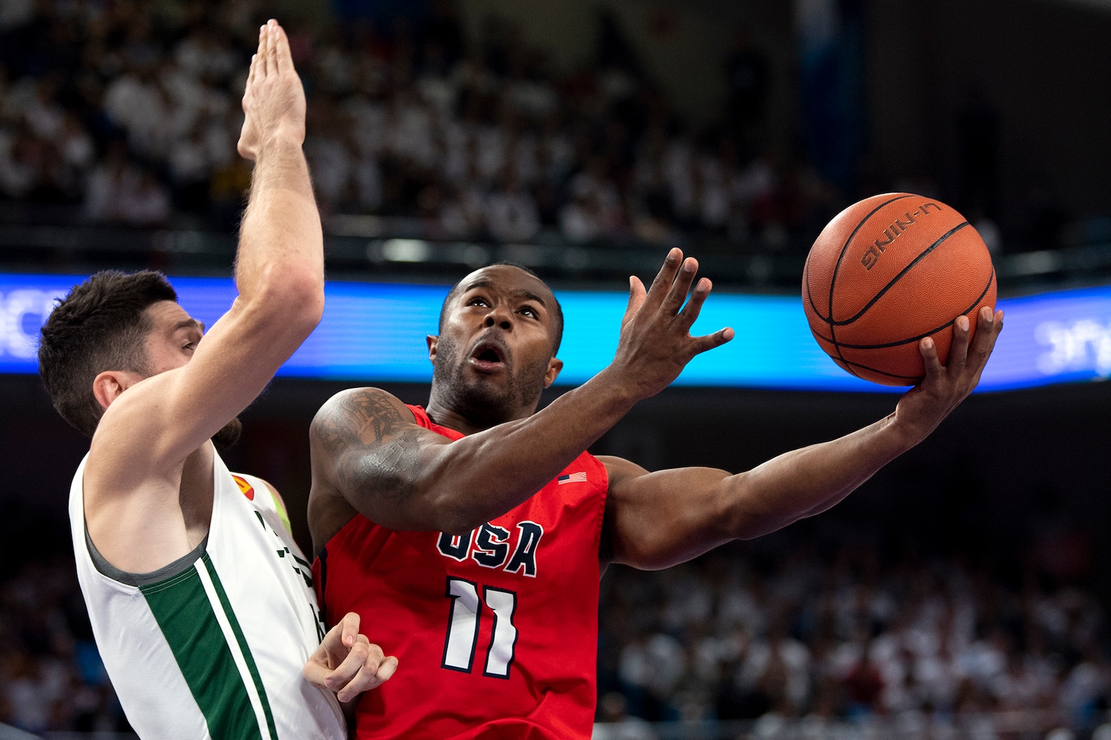 U.S. Marine Corps Cpl. Bryan Baptiste puts up a shot during the gold medal men’s basketball round with Lithuania in the 2019 CISM Military World Games in Wuhan, China Oct. 26, 2019. (DoD photo by EJ Hersom)