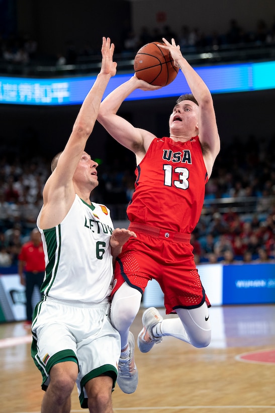 U.S. Air Force 2nd Lt.  Jacob Van drives to the net during the during the gold medal men’s basketball with Lithuania in the 2019 CISM Military World Games in Wuhan, China Oct. 26, 2019. The U.S. team won silver. (DoD photo by EJ Hersom)