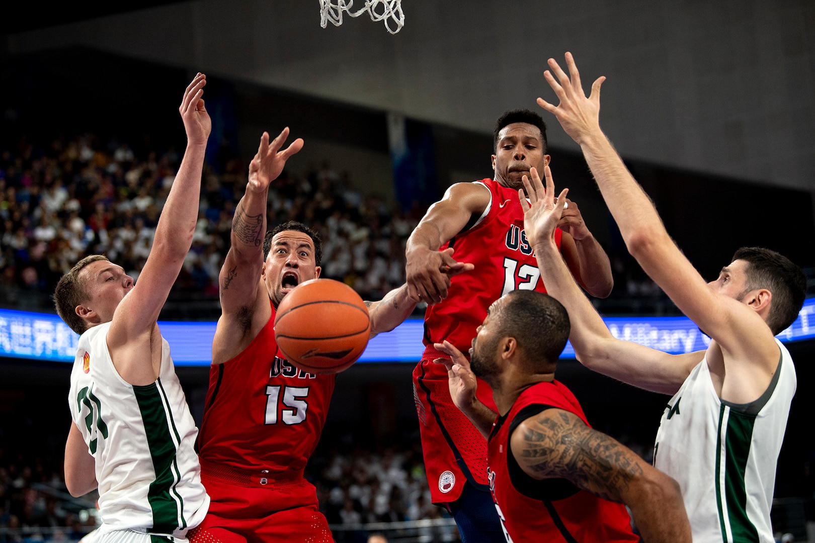 The U.S. Armed Forces Men’s Basketball Team battles under the net with Ukraine during the gold medal men’s basketball with Ukraine in the 2019 CISM Military World Games in Wuhan, China Oct. 26, 2019. The U.S. team won silver. (DoD photo by EJ Hersom)