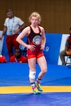 Staff Sgt. Whitney Conder with the U.S. Armed Forces Wrestling Team waits for a challenge review during her match against Nada Ashour of Egypt in the 50kg.weight class at the Military World Games in Wuhan, China, Oct. 22, 2019. Conder prevailed 11-0 and earned a silver medal in the games.  (DoD photo by Mass Communication Specialist 1st Class Ian Carver)