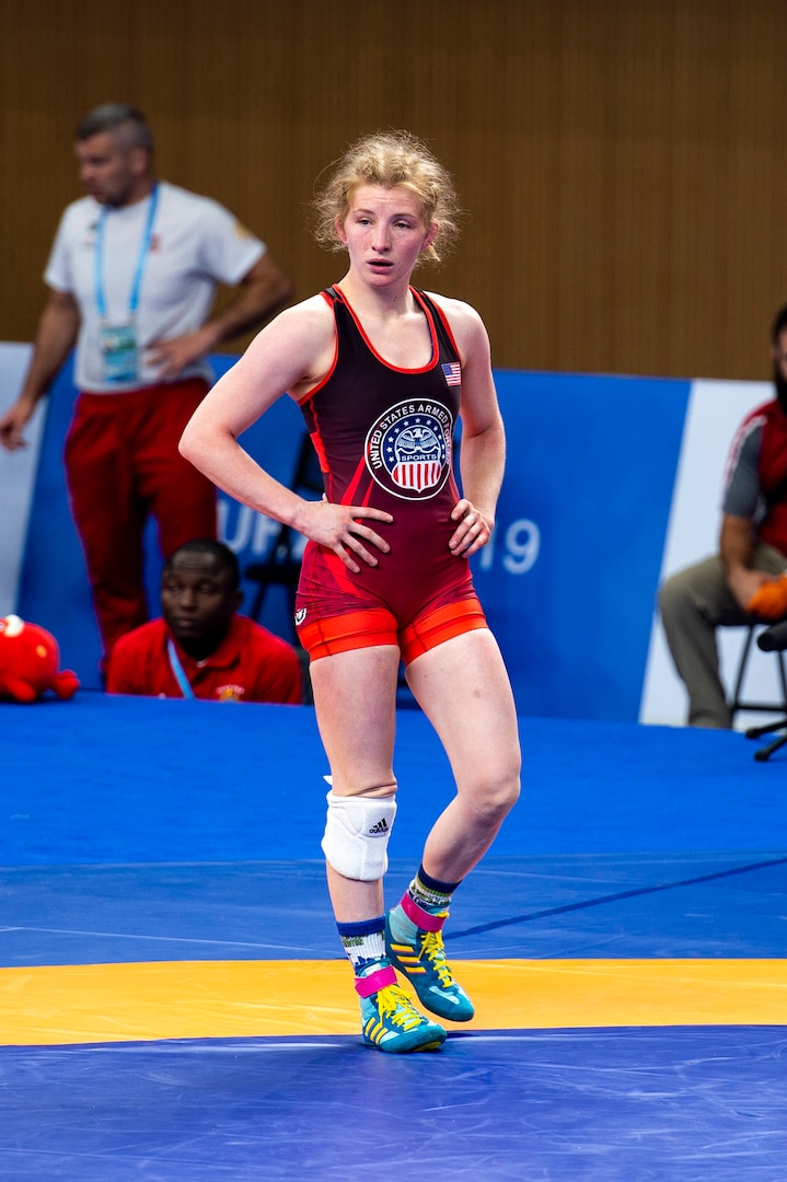 Staff Sgt. Whitney Conder with the U.S. Armed Forces Wrestling Team waits for a challenge review during her match against Nada Ashour of Egypt in the 50kg.weight class at the Military World Games in Wuhan, China, Oct. 22, 2019. Conder prevailed 11-0 and earned a silver medal in the games.  (DoD photo by Mass Communication Specialist 1st Class Ian Carver)