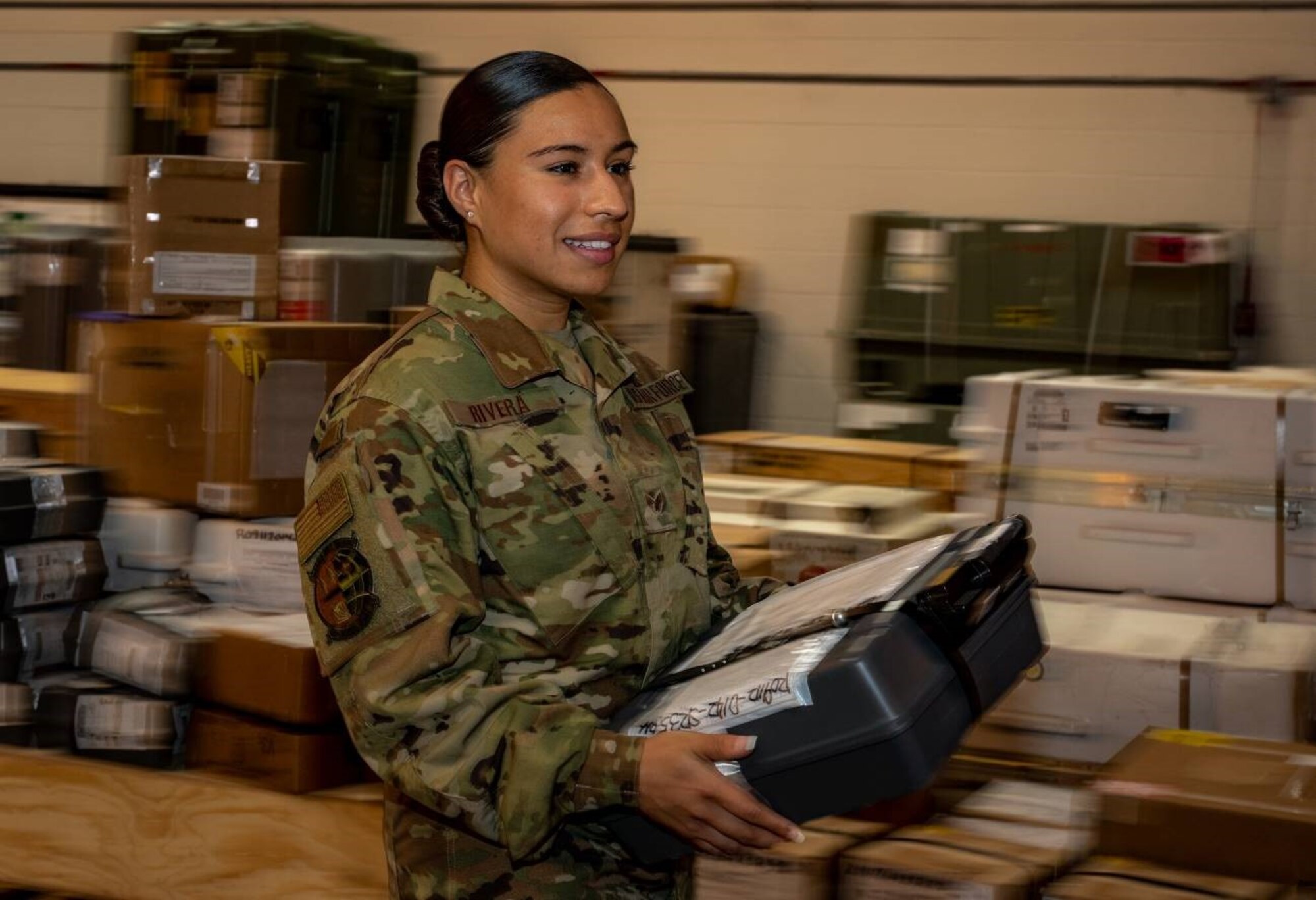 Airman carrying package
