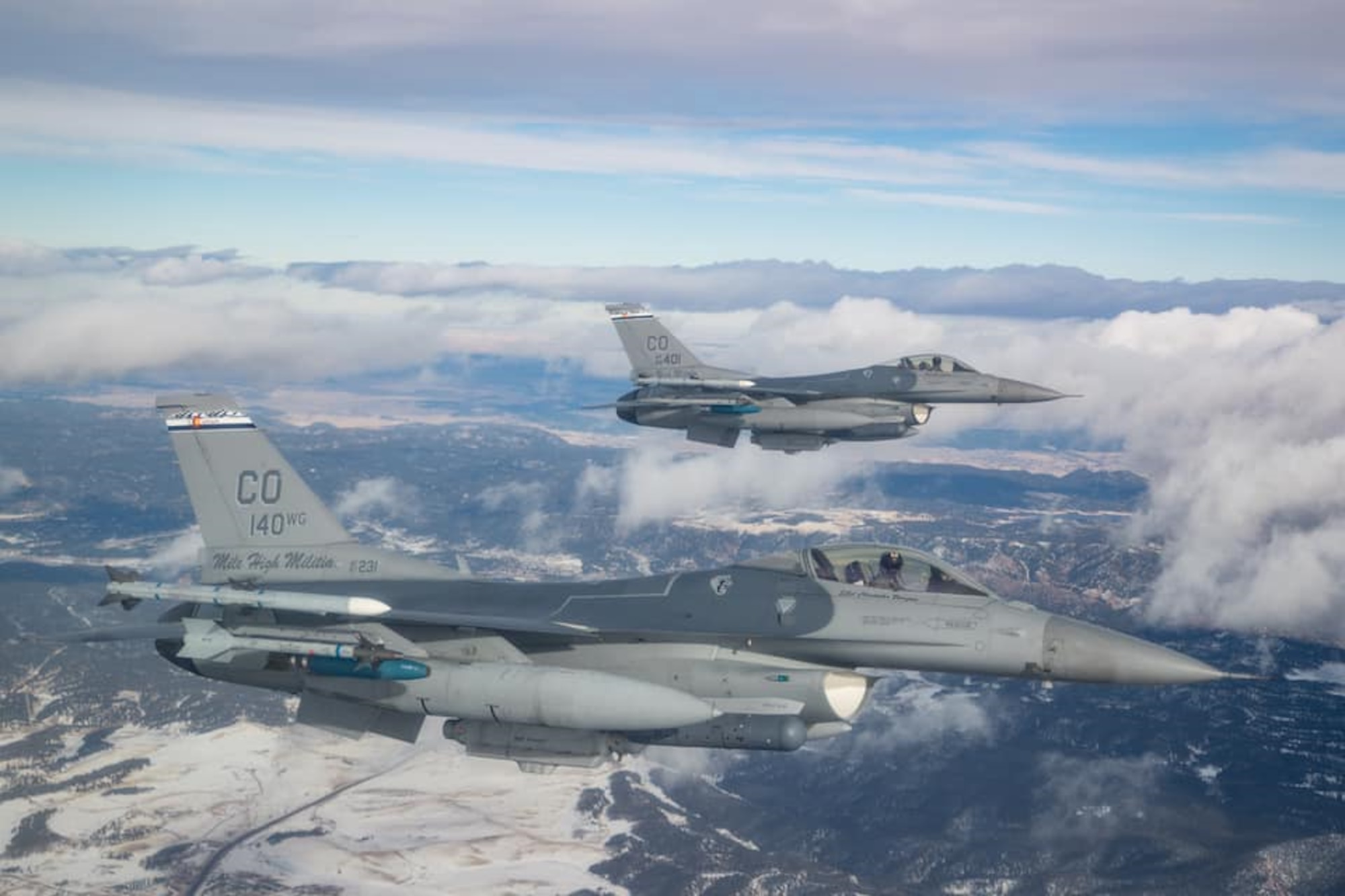 Two F-16s flying in formation