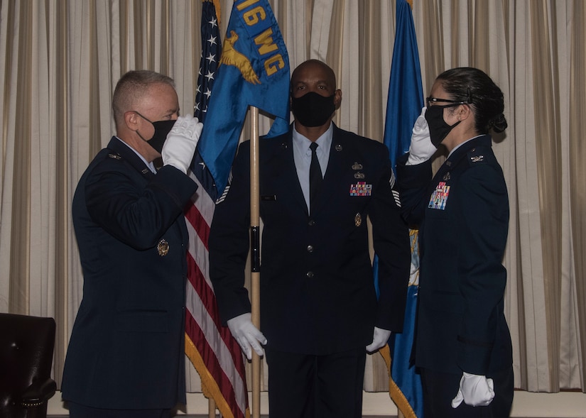 Col. Nichole Scott (right), salutes Col. Tyler Schaff, 316th Wing and Joint Base Andrews commander to assume command of the 316th Mission Support Group during an assumption of command ceremony at JBA, Md., July 2, 2020.
