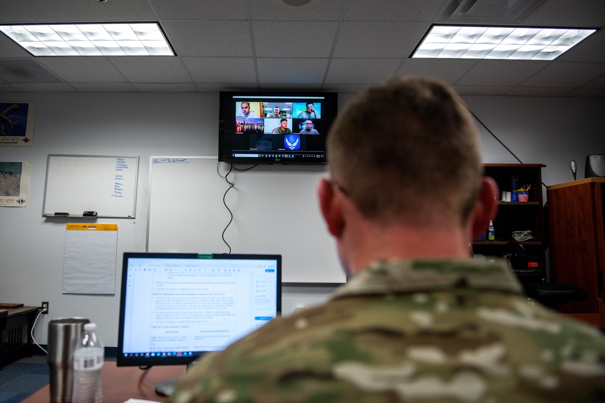 U.S. Air Force Tech. Sgt. Pete Hilleren (right), Robert D. Gaylor Non-Commissioned Officer Academy (NCOA) student instructor, engages with his students during a virtual class June 23, 2020, at Joint Base San Antonio-Lackland, Texas.