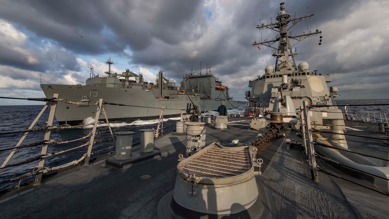 USS Carney (DDG 64) undergoes a replenishment-at-sea with the Lewis and Clark-class dry cargo ship USNS Medgar Evers (T-AKE-13), July 16, 2019.