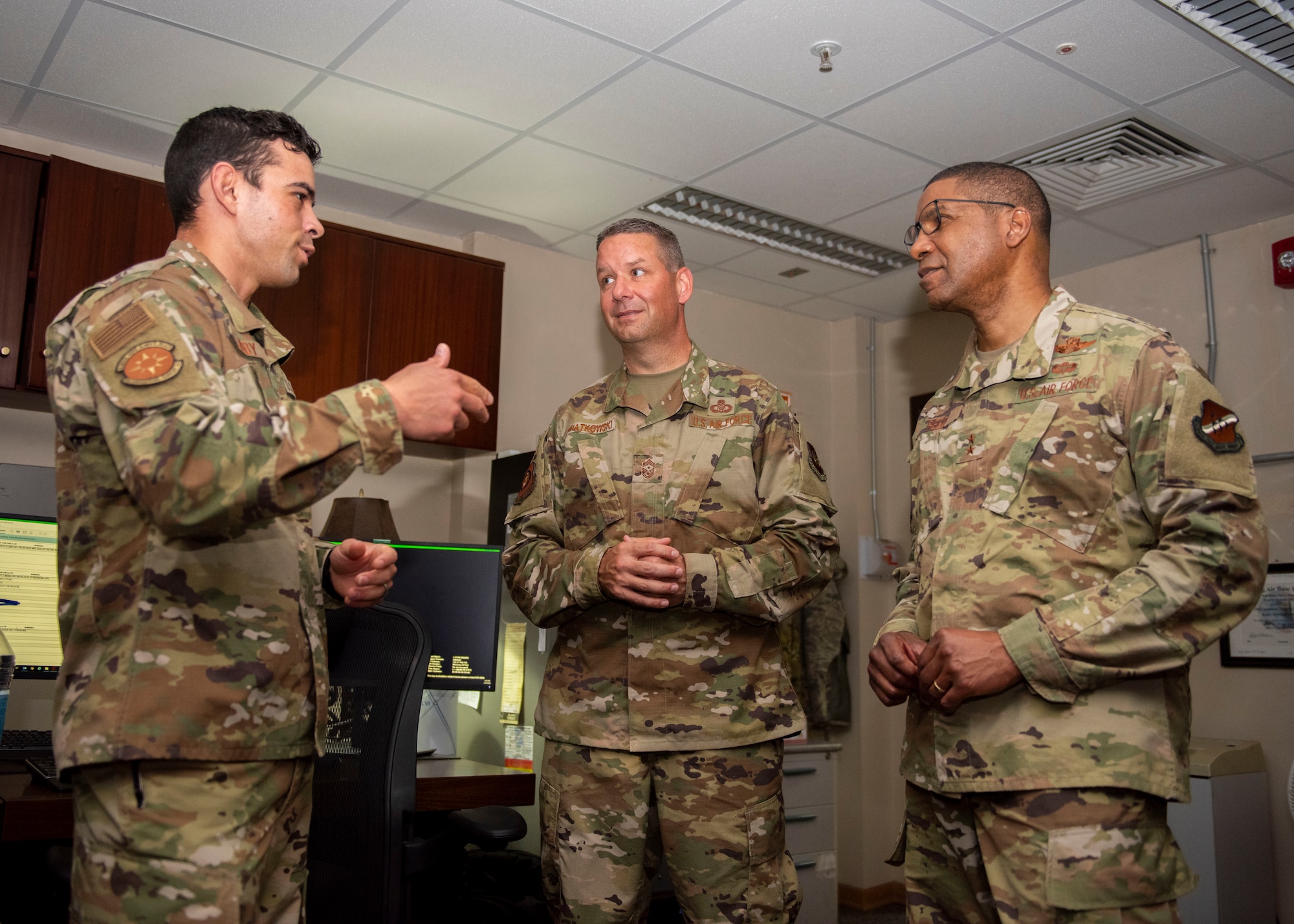 U.S. Air Force Staff Sgt. Ryan Libby, Radar Approach Control watch supervisor, discusses air operations procedures with U.S. Air Force Maj. Gen. Randall Reed, 3rd Air Force commander, and Chief Master Sgt. Randy Kwiatkowski, 3rd Air Force command chief master sergeant,at Incirlik Air Base, Turkey.  The RAPCON team is responsible for any aircraft in their airspace, including non-military flights coming from nearby areas.  (U.S. Air Force photo by Senior Airman Matthew Angulo)